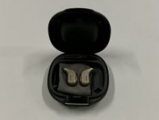 A Pair of Oticon Intent 2 Hearing Aids with case. As new, marks on bottom of case
