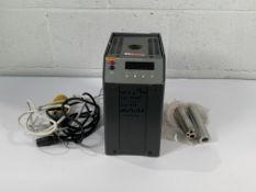 Pre-owned Fluke 9103 Below Ambient Dry Well Calibrator with carry case.