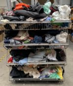 Assorted pre-owned clothing and related items.