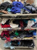 Assorted pre-owned clothing and related items.