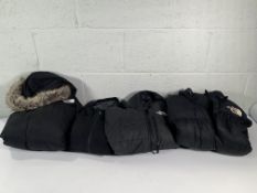 Four pre-owned The North Face Puffer Jackets in Black (sizes: 1x women's XL, 1x boy's L, 1x girl's S