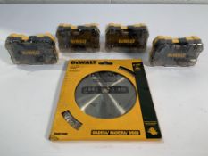 DeWalt related items; four attachment piece sets and a pack of wood saw blades 36t, 7.1/4