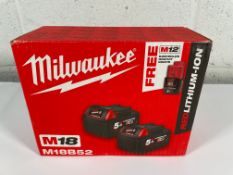As new Milwaukee 4932451242 M18 B52 2x5.0 Ah Battery Kit 18 V.