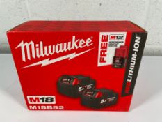 As new Milwaukee 4932451242 M18 B52 2x5.0 Ah Battery Kit 18 V.