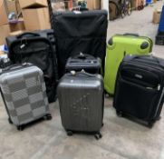 Seven assorted pre-owned suitcases to include Samsonite, America Tourister, Eminent, Crag hoppers, T