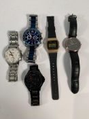Five pre-owned wrist watches to include Fossil, Bering and Hugo Boss.