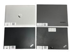 Four pre-owned laptops.