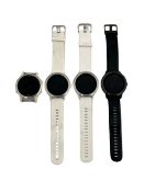 Four pre-owned Garmin Smartwatches (Untested, sold as seen).