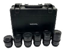 Six pre-owned Samyang EF mount lenses in a custom foam lined case (See description).