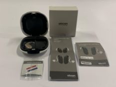 An Oticon Engage BTE Hearing Aid in Beige and White Case.