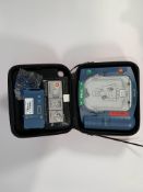 Pre-owned Philips Heartstart HS1 Defibrillator with Carry Case and Battery.