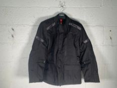 A men's as new IXS Evans-ST 2.0 Waterproof Touring Motorcycle Textile Jacket, Black, Size 2XL.