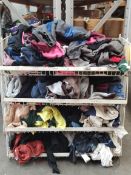 Four baskets of pre-owned clothing to include hoodies, t-shirts and more.