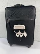A preowned Karl Lagerfeld suitcase in black.