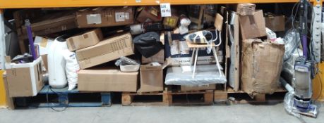 A large quantity of home related items to include vacuums, an air purifier, posters and more.
