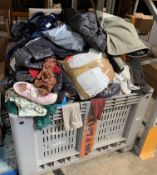 Large quantity of assorted pre-owned clothing and related items (stillage not included).