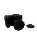 Pre-owned Canon PowerShot SX410 IS Digital Camera with battery.