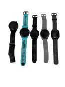 Four pre-owned Garmin Smartwatches (Untested, sold as seen).