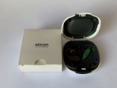 An as new Oticon OPN Play 1 BTE PP in brown tar (REF: 213023).