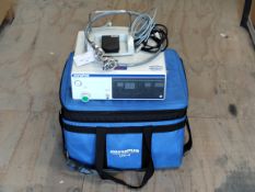 A preowned Olympus UHI-4 High Flow Insufflation Unit, 100-240V, 50/60Hz, 110VA with travel bag.