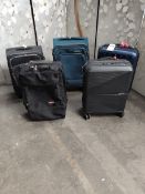 Four pre-owned American Tourister wheeled suitcases and an Eastpax wheeled suitcase.