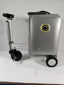 A pre-owned Airwheel Robot SE35 ride-on suitcase with battery and charger.