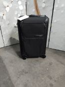 A pre-owned Tumi soft shell black wheeled carry on suitcase (damage to carry handle).