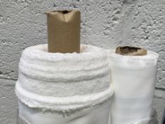 Roll of fabric - approximately 150cm wide (length unknown).