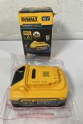 A DeWalt DCBP518 5.0Ah 18V XR Powerstack battery.