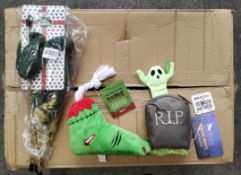 A pallet of miscellaneous pet products, mainly consisting of toys.