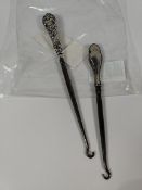 Two pre-owned Edwardian silver handle button hooks; one William J Holmes and one C R & Co.