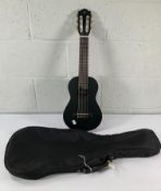 A pre-owned Yamaha Guitalele GL1 with travel bag.