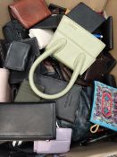A quantity of assorted pre-owned wallets, purses and related.