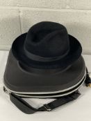A pre-owned Borsalino felt hat and travel case.