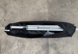 Pre-owned Expand flag stand XL with carry bag (some damage to bag/sold as seen).