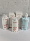 Five Clarins beauty products to include body partner 175ml and body firming cream 200ml.