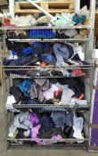 Four baskets of assorted pre-owned clothing and related items.