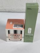 A Clinique moisture surge 100H auto replenishing hydrator 200ml and Clinique moisture surge lotion 2