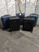 Five assorted pre-owned Samsonite wheeled suitcases.