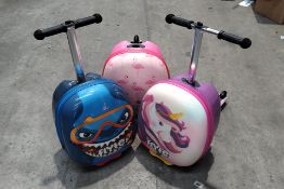 Three pre-owned Flyte scooter suitcases for children.