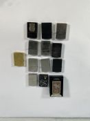 Thirteen pre-owned Zippo lighters (over 18s only).