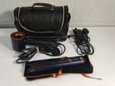 Two pre-owned Dyson hairstyling products to include a Dyson Corrale straightener in prussian blue/ri