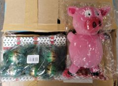 A pallet of miscellaneous pet products, mainly consisting of toys.