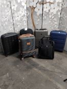 Six pre-owned wheeled suitcases to include American Tourister x 2, Victorinox, IT, Thule and Tripp.