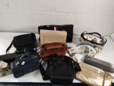 A quantity of assorted shoulder/hand/cosmetics bags and related.