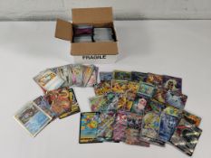 A quantity of assorted Pokemon Cards, some Japanese language cards but mostly English (approximately