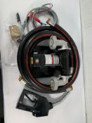 An as new Adam Pumps Self Priming Diesel Transfer Pump 12V (WT50202WES) and accessories.