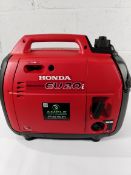 A Honda EU20i 2200W portable 'suitcase' silent inverter petrol generator (with some minor damage, so