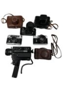 Assorted vintage cameras, lenses and cases including Minolta, Zenit & Elmo.