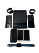 Assorted pre-owned items sold for parts including Apple iPad, iPhones, Apple Watches & Android Smart
